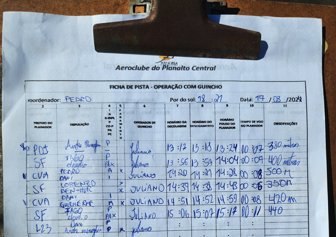 Paper runway log sheet, filled in by hand at the runway
